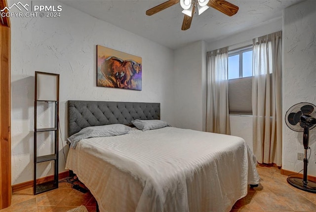 bedroom featuring ceiling fan