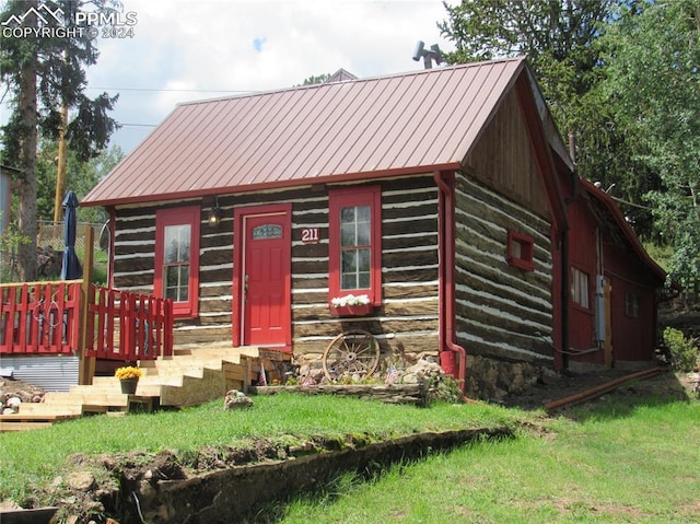 exterior space with a lawn