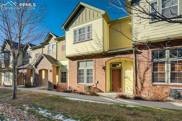 view of front of property featuring central AC unit