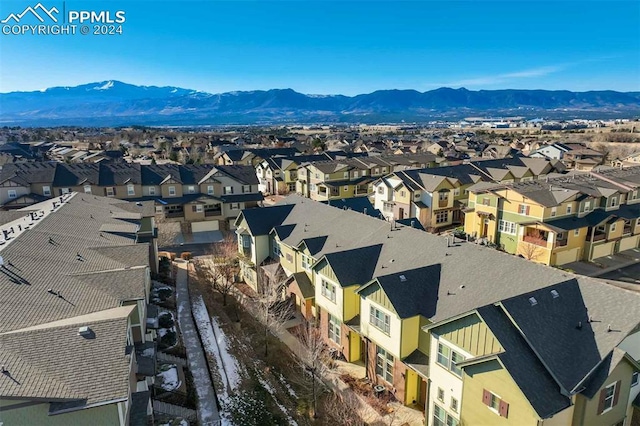 drone / aerial view featuring a mountain view