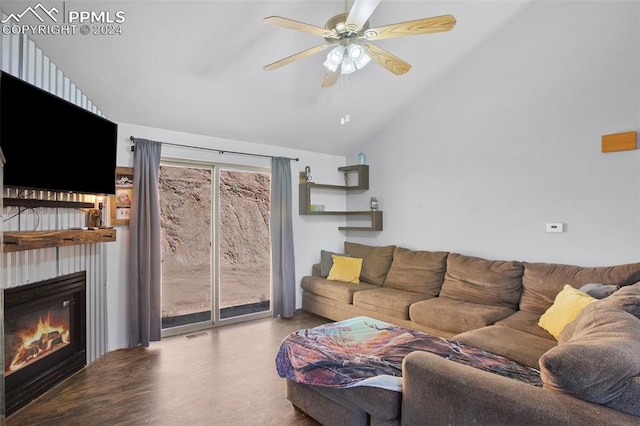 living room with lofted ceiling, light wood-type flooring, and ceiling fan