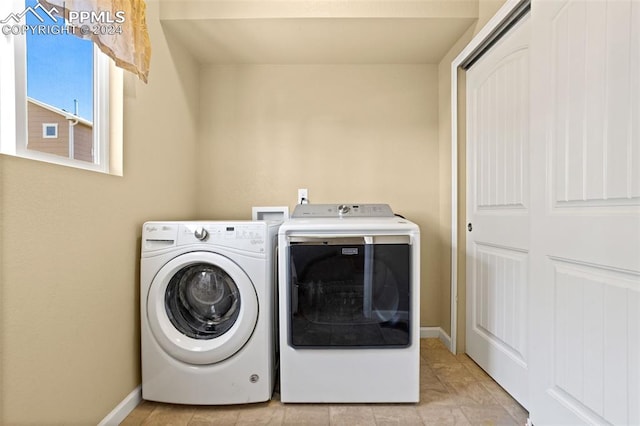 laundry room featuring independent washer and dryer