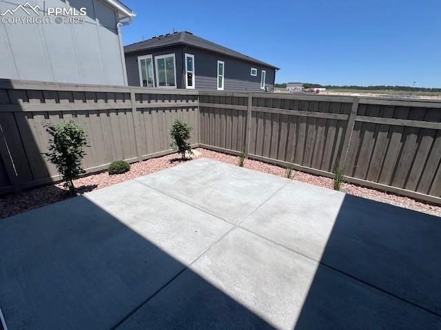 7010 Knapp Dr, Colorado Springs, CO 80924 - fenced backyard with a patio area