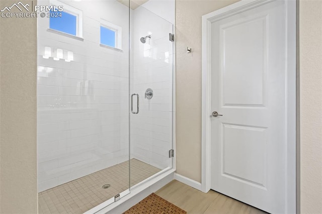 bathroom featuring walk in shower