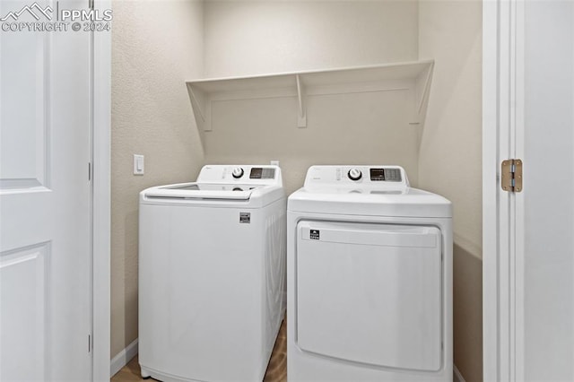 laundry room with washer and dryer