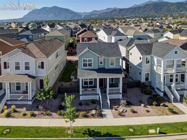 drone / aerial view featuring a mountain view