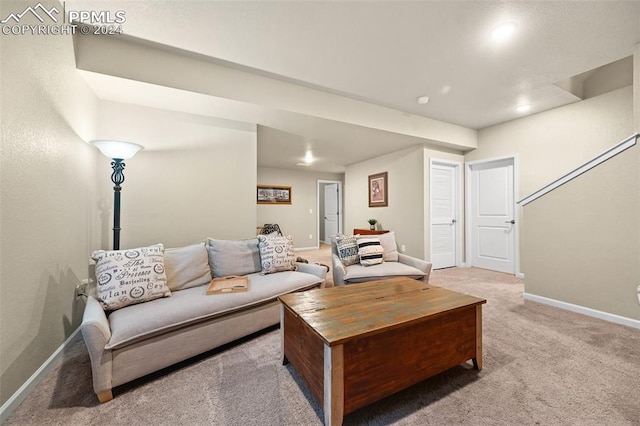 living room with light colored carpet