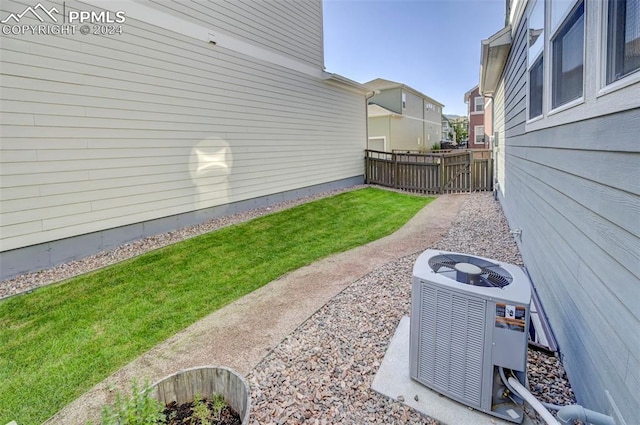 view of yard with central AC unit