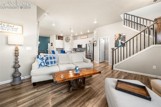 living room with hardwood / wood-style floors