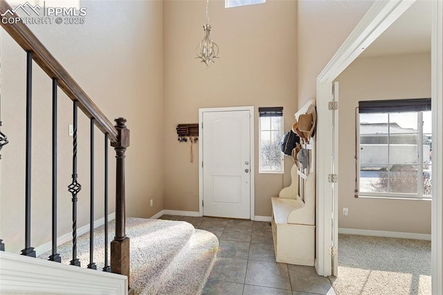 entrance foyer with tile patterned floors