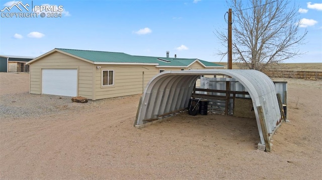 exterior space featuring a carport