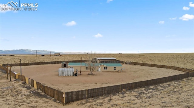 exterior space featuring a mountain view and a rural view