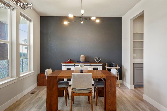 dining area with light wood-type flooring