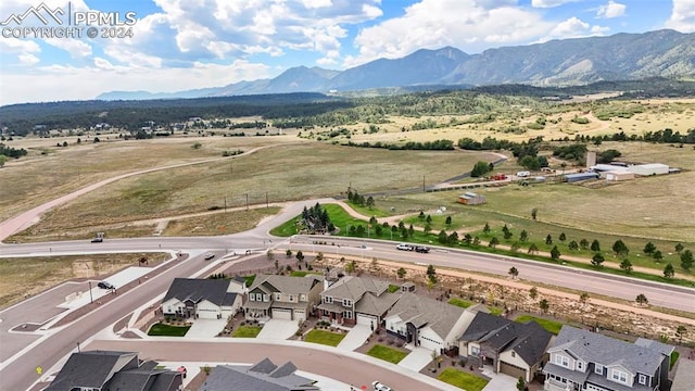 drone / aerial view featuring a mountain view