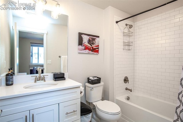 full bathroom with shower / bath combo, toilet, and vanity