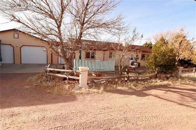 view of front of property with a garage