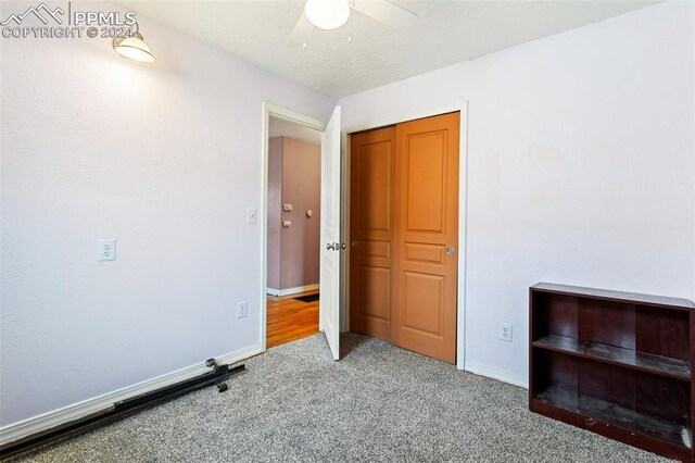 928 Alexander Rd, Colorado Springs, CO 80909 - carpeted bedroom featuring ceiling fan and a closet