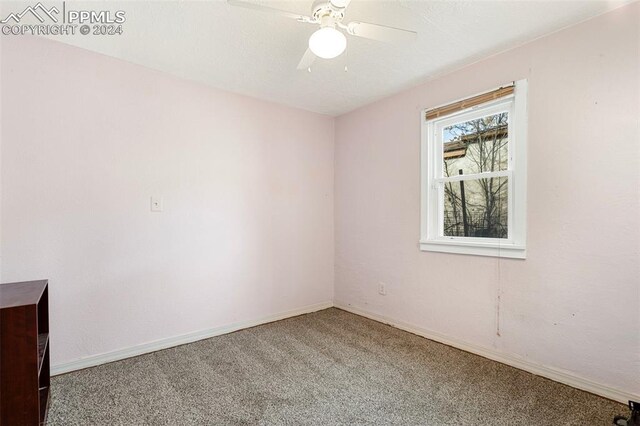 928 Alexander Rd, Colorado Springs, CO 80909 - unfurnished room with ceiling fan and carpet