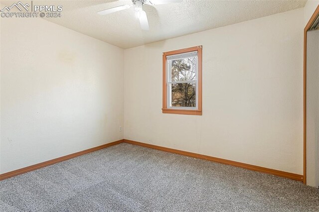 928 Alexander Rd, Colorado Springs, CO 80909 - empty room featuring carpet, ceiling fan, and a textured ceiling