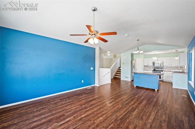 unfurnished living room featuring vaulted ceiling, sink, ceiling fan with notable chandelier, and dark hardwood / wood-style floors