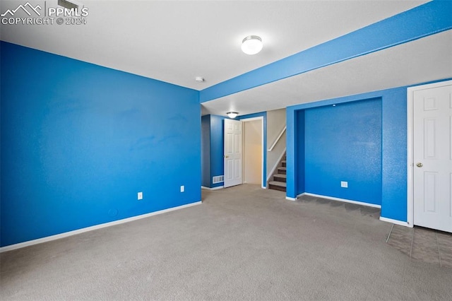 unfurnished bedroom featuring carpet