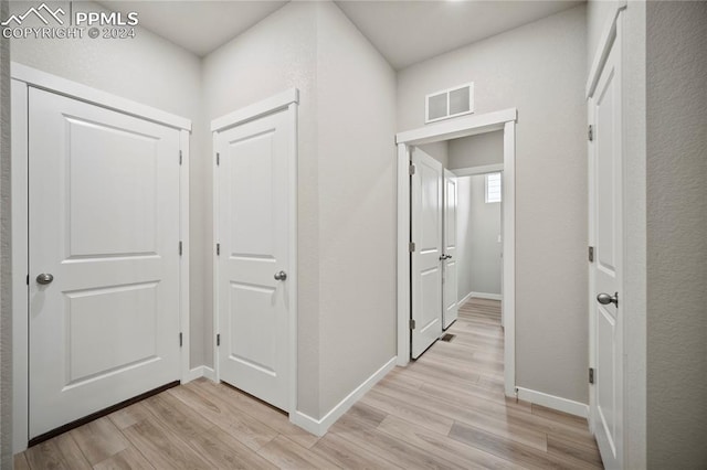 hall featuring light hardwood / wood-style flooring