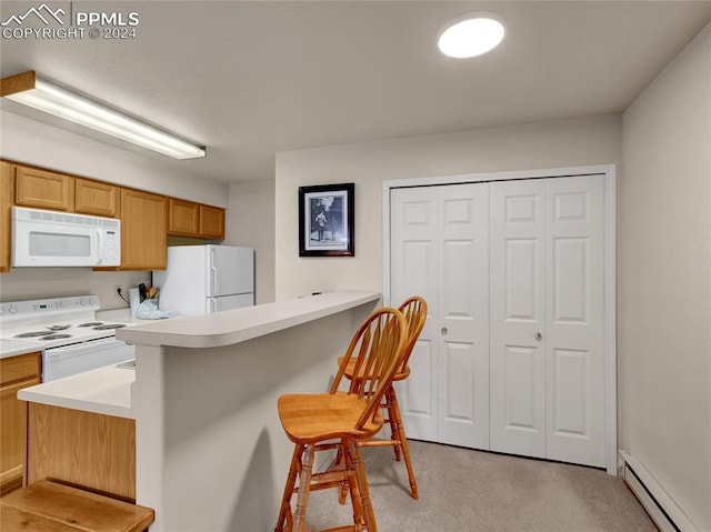 kitchen with kitchen peninsula, a breakfast bar, white appliances, light colored carpet, and a baseboard heating unit