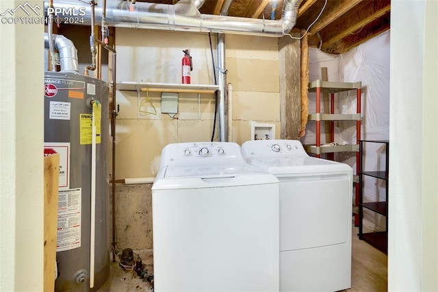 laundry area featuring washer and clothes dryer and gas water heater