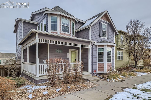 victorian home featuring a porch