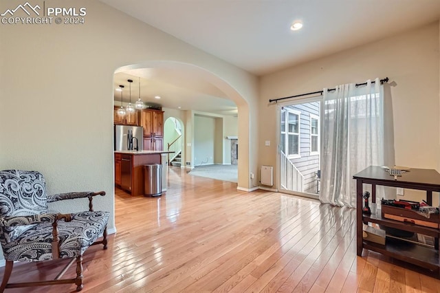 sitting room with light wood-type flooring