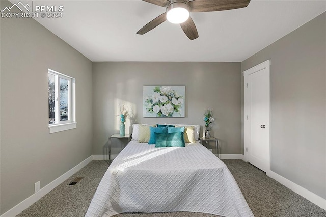 carpeted bedroom featuring ceiling fan