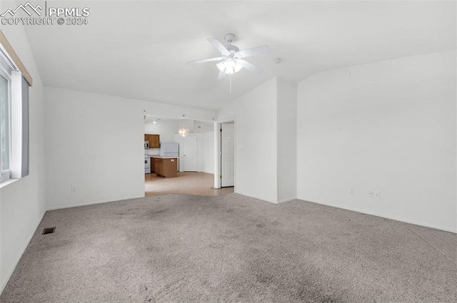 unfurnished living room featuring light carpet, ceiling fan, and lofted ceiling