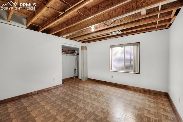 basement with parquet floors