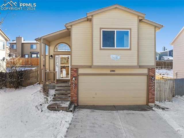 view of front of property featuring a garage