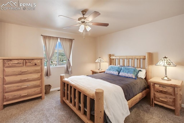 bedroom with ceiling fan and carpet