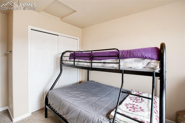 bedroom featuring a closet and carpet