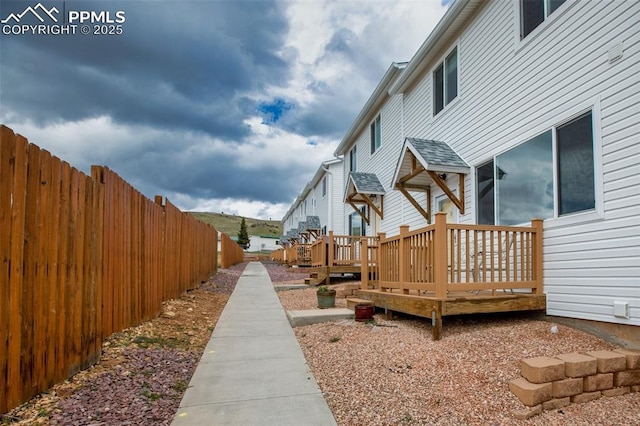 view of yard featuring a wooden deck