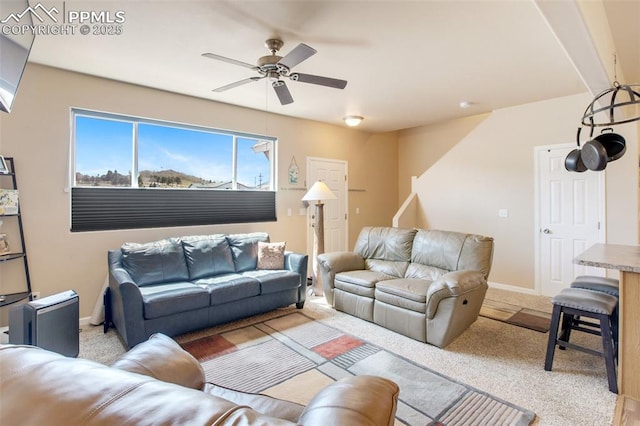 living room featuring ceiling fan and light colored carpet