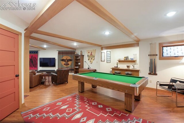 playroom with hardwood / wood-style floors, beam ceiling, and pool table