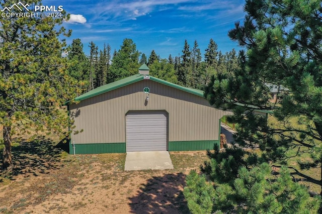 view of outdoor structure with a garage