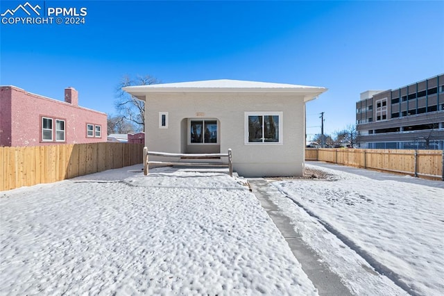 view of snow covered property