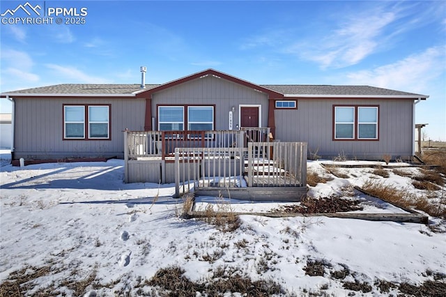 manufactured / mobile home featuring a wooden deck