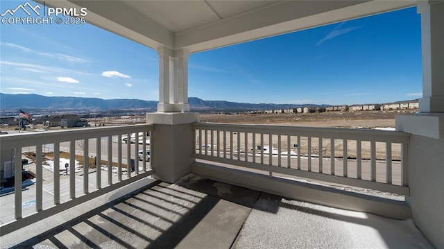 balcony featuring a mountain view