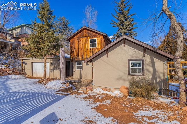 view of snow covered property