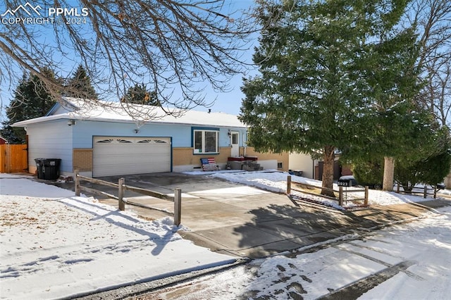 single story home featuring a garage