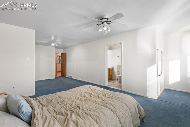 bedroom featuring connected bathroom, ceiling fan, and dark carpet