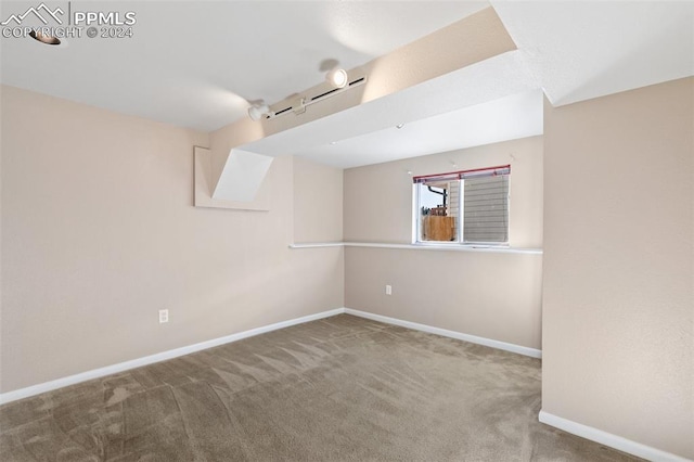 basement with carpet flooring