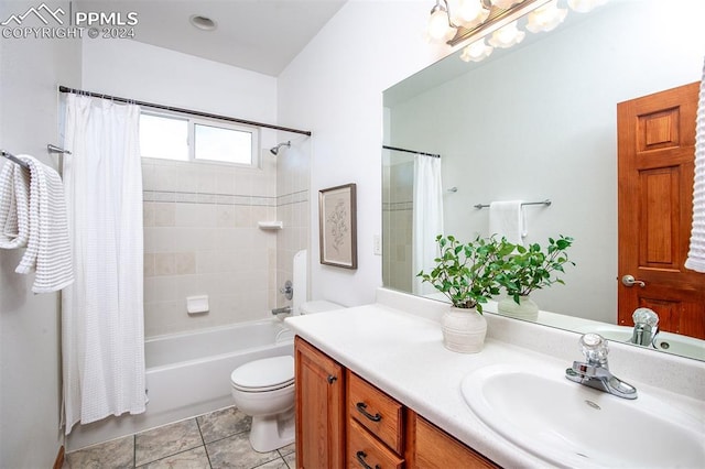 full bathroom with tile patterned flooring, shower / tub combo, vanity, and toilet