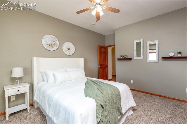 carpeted bedroom featuring ceiling fan and lofted ceiling