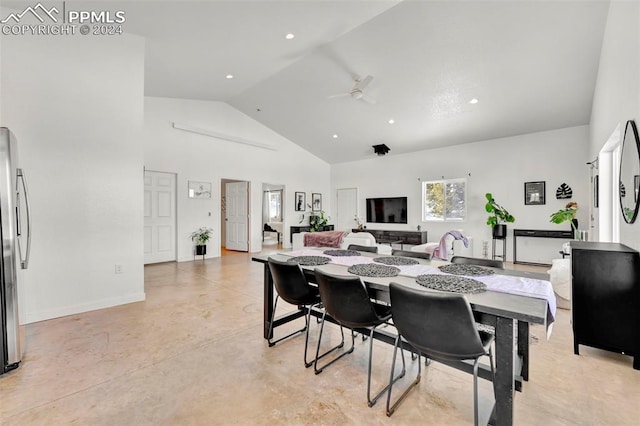 dining space featuring ceiling fan and high vaulted ceiling